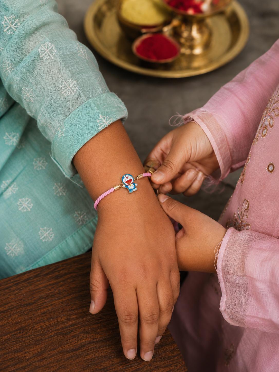 925 Sterling Silver Doraemon Cartoon Rakhi For Kids With Roli-Chawal Set - Image 3